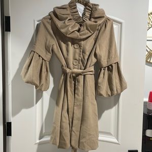 Stunning cream colored jacket. Soft and flattering